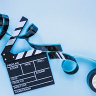 clapperboard-with-filmstrip-blue_23-2147807347